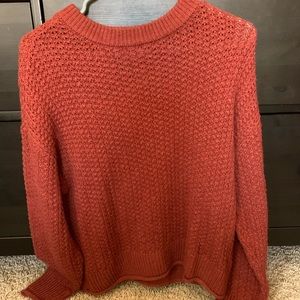Reddish-pink sweater